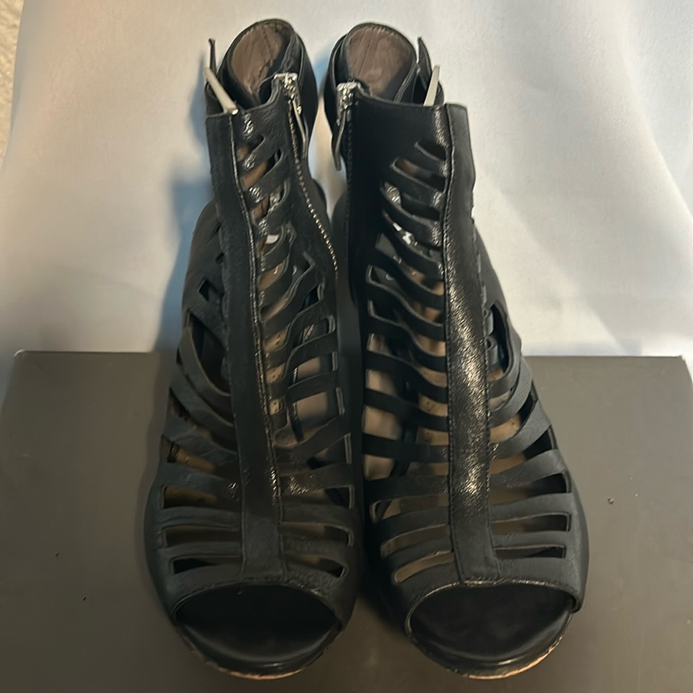Gently used black gladiator style heel/sandal.